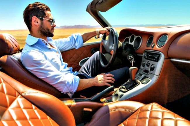 man driving convertable