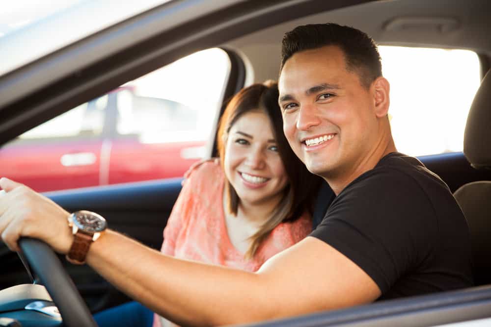boyfriend and girlfriend driving